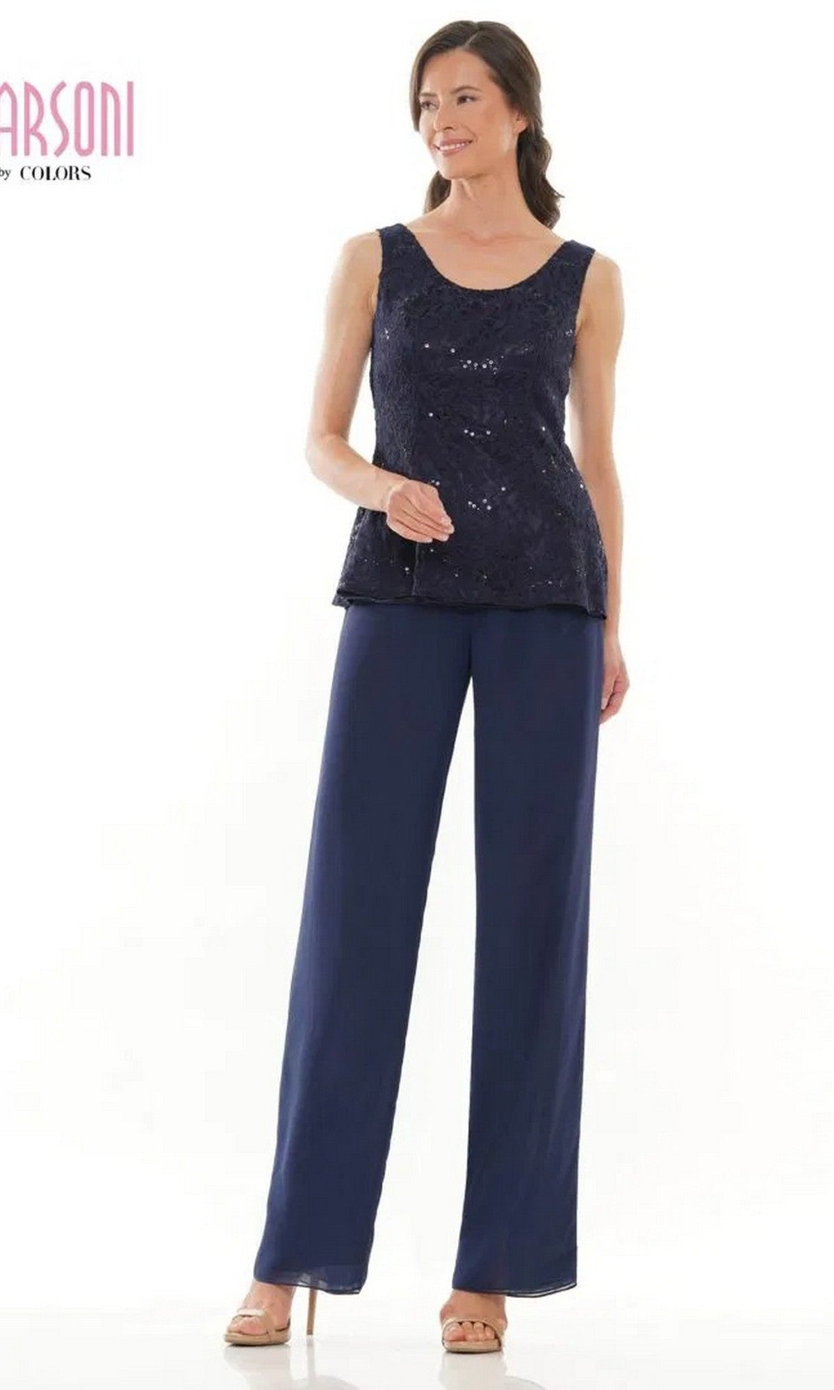 A woman wearing the Marsoni M305 Long Formal Pantsuit—featuring a sleeveless navy blue sequin top and matching chiffon pants—stands against a plain white background.